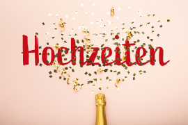 Creative flat lay champagne bottle with star confetti on pink